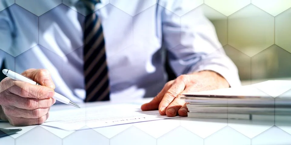 Businessman checking a document, geometric pattern Stock Photos
