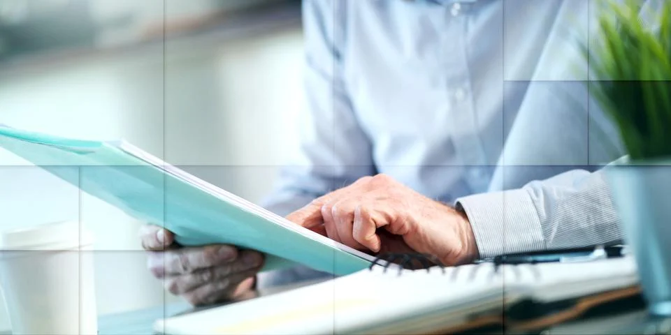 Businessman checking a document, geometric pattern Stock Photos