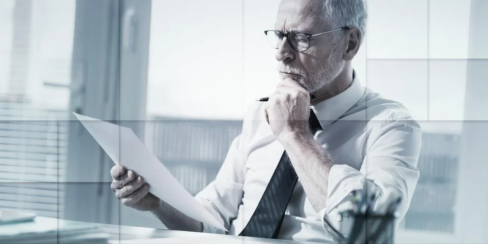Businessman checking a document, geometric pattern Stock Photos