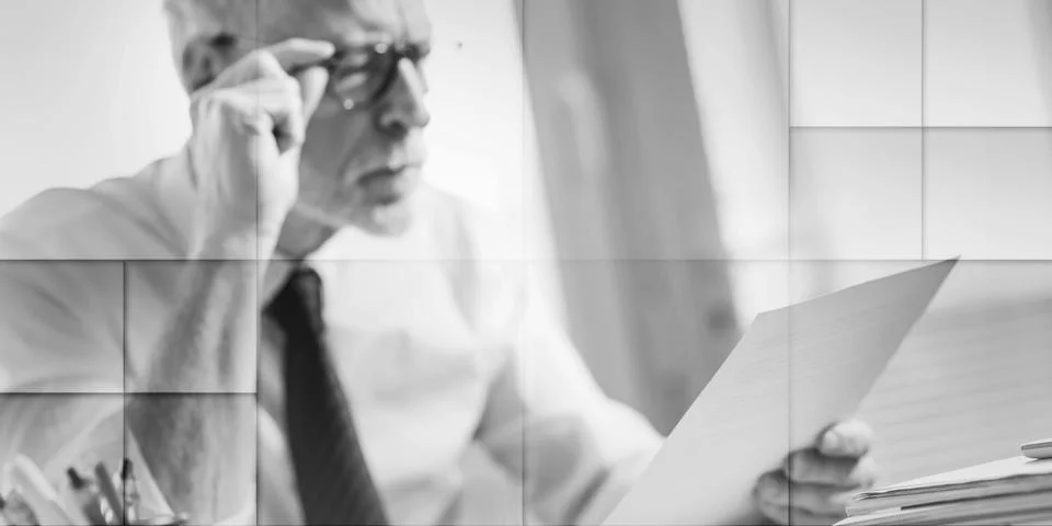 Businessman checking a document, geometric pattern Stock Photos