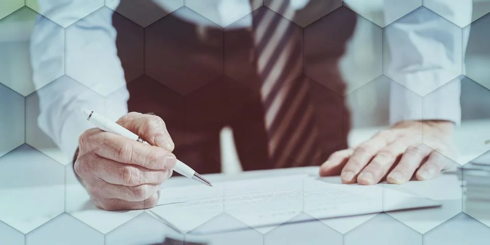 Businessman checking a document, geometric pattern Stock Photos