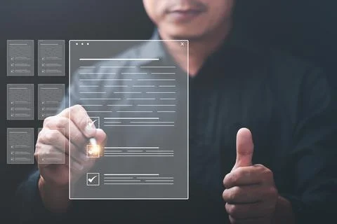 Businessman checking documents online,commenting, putting checkmark on a bu.. Stock Photos