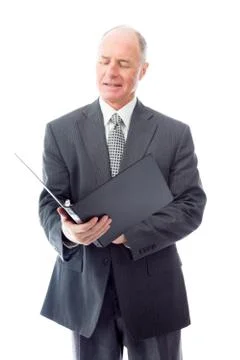 Businessman checking a file Stock Photos