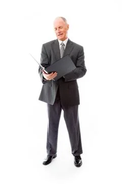 Businessman checking a file Stock Photos