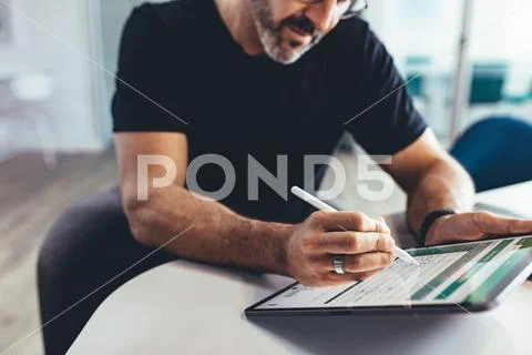 Businessman checking financial report Stock Photos