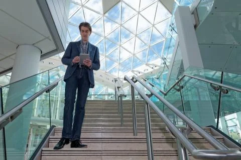 Businessman checking his tablet Stock Photos