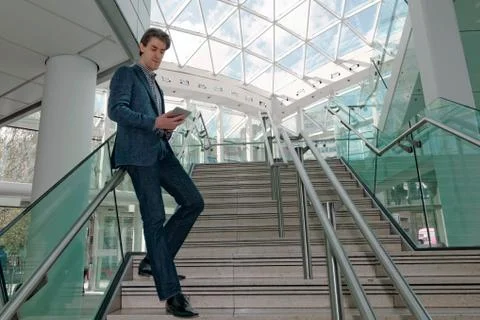 Businessman checking his tablet Stock Photos