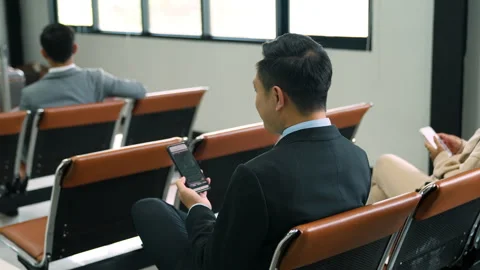 Businessman checking information on mobile phone Stock Footage 243716483