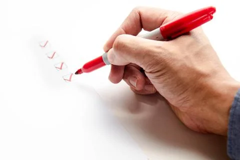 Businessman checking mark on the check boxes Foto stock