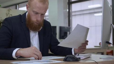 Businessman checking report Stock Footage 83344013