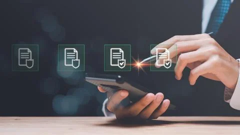 Businessman checking the steps through document with a list of checkboxes ,.. 스톡 사진