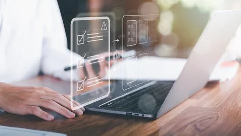 Businessman checking the steps through a virtual online document with a lis.. Foto stock