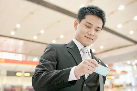 Businessman Checking the Ticket Stock Photos