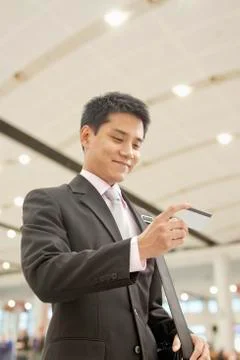 Businessman Checking the Ticket Stock Photos