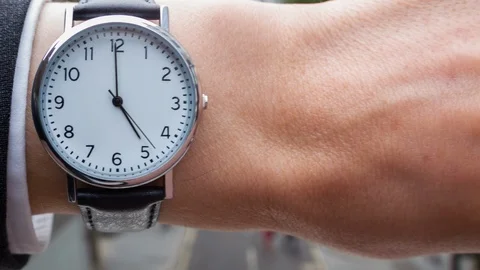 Businessman checking the time Video stock 104046958