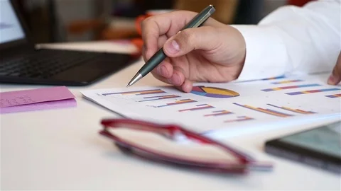 Businessman Checks Stack Data Stock Footage 74550130