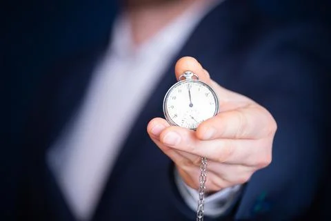 Businessman with clock in time concept 스톡 사진