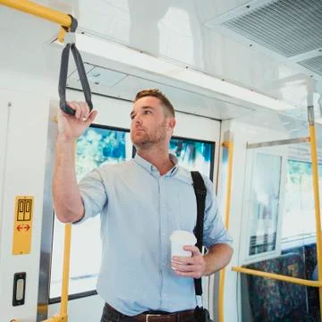 Businessman Commuting to Work Stock Photos