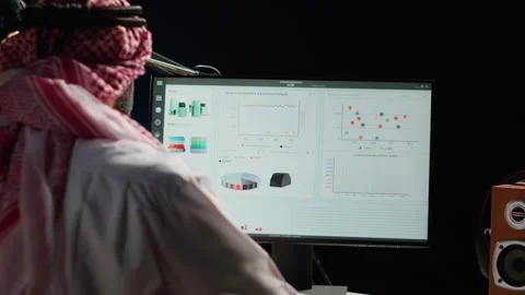 Businessman comparing analytics data Stock Footage 255566571