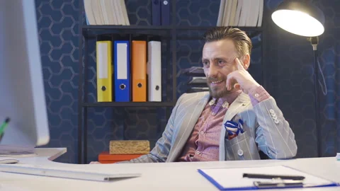 Businessman completing his work, completing project in his office and relaxing. Stock-Footage 230930023