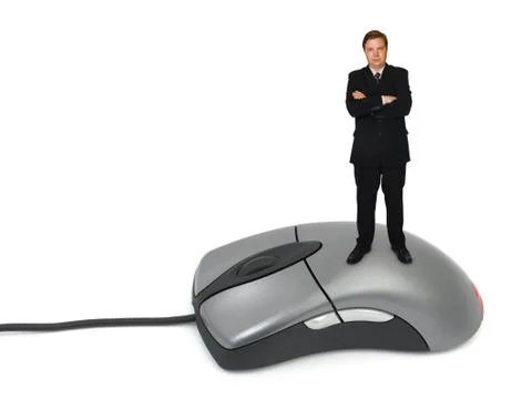 Businessman on computer mouse Foto stock