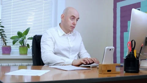 Businessman with computer in office print text on the keyboard, sends an email. Stock Footage 76285703