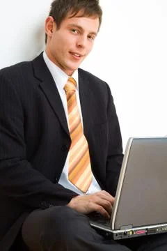 Businessman with computer Stock Photos
