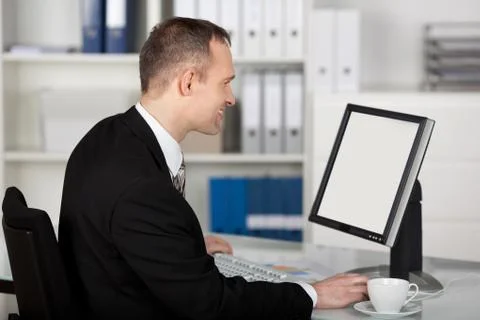 Businessman with computer Stock Photos
