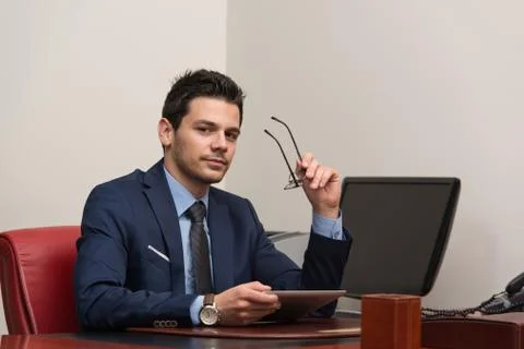 Businessman with computer Stock Photos