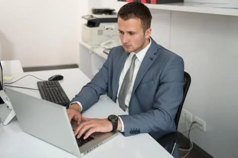 Businessman With Computer Stock Photos
