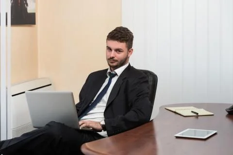 Businessman With Computer Stock Photos