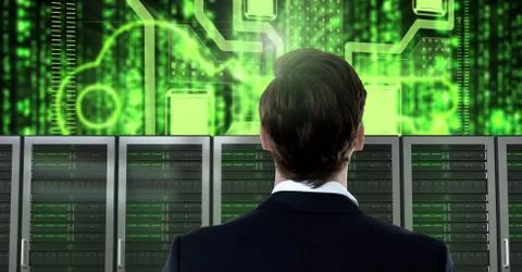 Businessman with computer servers and technology information interface Stock Photos