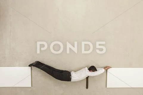 Businessman connecting two platforms Stock Photos