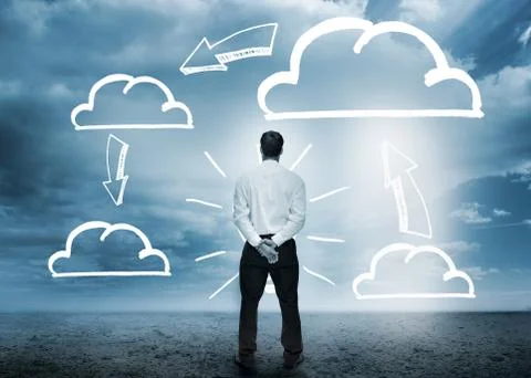 Businessman considering cloud computing graphics Foto stock