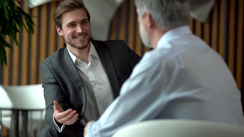 Businessman consult client about contract explain startup give advice at meeting Stock Footage 201255192