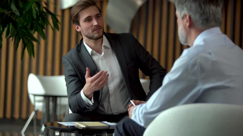 Businessman consult client about contract explain startup give advice at meeting Stock Footage 201255730