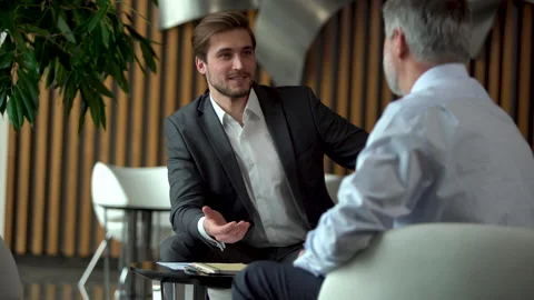 Businessman consult client about contract explain startup give advice at meeting Stock Footage 201255947