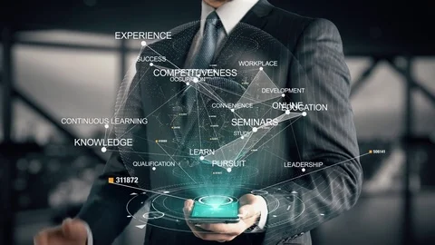 Businessman with Continuous Learning hologram concept Vídeos de archivo 84188939