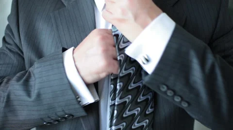 Businessman corrects tie Stock Footage 67514127