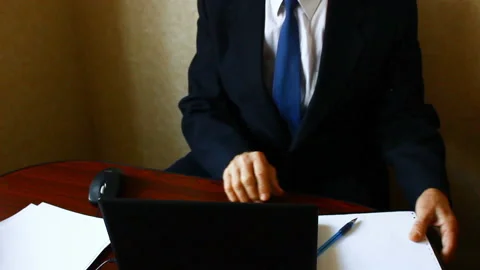 The businessman costs, does notes on paper. Stock Footage 87115107