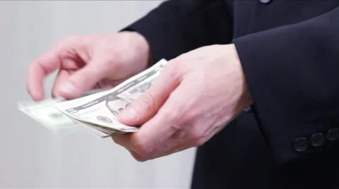 Businessman Counting Dollars Stock Footage 12712499