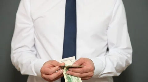 Businessman counting dollars Stock Footage 57108523