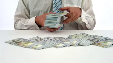 Businessman Counting Stack of Dollar Money USD, Isolated White Background Stock Footage 76514675
