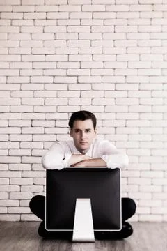 Businessman crying on old computer Stock Photos