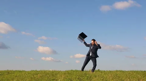 Businessman dancing with a laptop Stock Footage 67693574