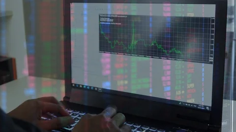 Businessman with data analysis graph of stock market financial Stock Footage 106699791