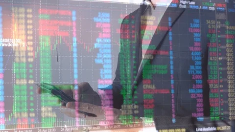 Businessman with data and analysis graph of stock market investment Stock Footage 106699829
