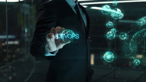 Businessman with DevOps hologram concept Stock Footage 121362034
