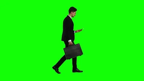 Businessman is a diplomat, a telephone rings to him and he talks. Green screen Stock Footage
