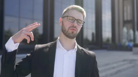Businessman Directs Finger Gun Gesture at His Head, Representing Stress, Mental Видео 330795341
